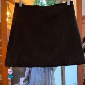 Black suede mini skirt with front slit